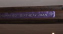 Personalised Purple printed banner for a Mum;:s 60th Birthday held at a cider press in Normandy - lovely! (click to enlarge)