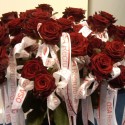 Printed ribbon wrapped around individual roses for marketing giveaway at Valentine;:s Day (click to enlarge)